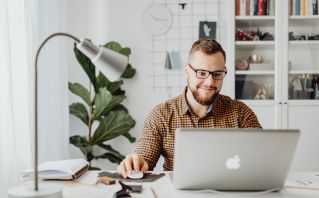 Man Using Macbook